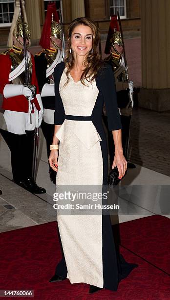 Queen Rania of Jordan attends a dinner for foreign Sovereigns to commemorate the Diamond Jubilee at Buckingham Palace on May 18, 2012 in London,...