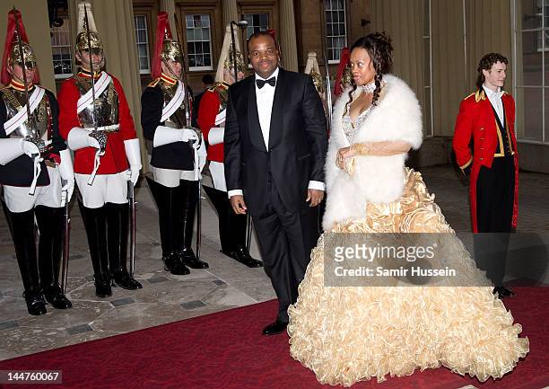 King Mswati III of Swaziland and Inkhosikati Lambikiza of Swaziland attend a dinner for foreign Sovereigns to commemorate the Diamond Jubilee at...