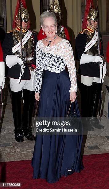 Queen Margarethe II of Denmark attends a dinner for foreign Sovereigns to commemorate the Diamond Jubilee at Buckingham Palace on May 18, 2012 in...