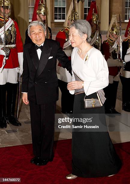 Emperor Akihito and Empress Michiko of Japan attend a dinner for foreign Sovereigns to commemorate the Diamond Jubilee at Buckingham Palace on May...