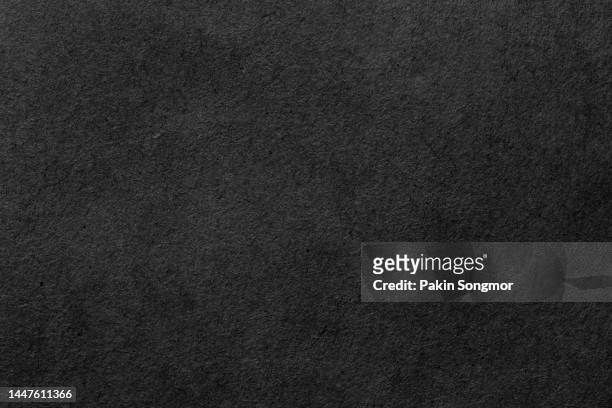 black paper sheet texture cardboard background. - black paper texture stockfoto's en -beelden