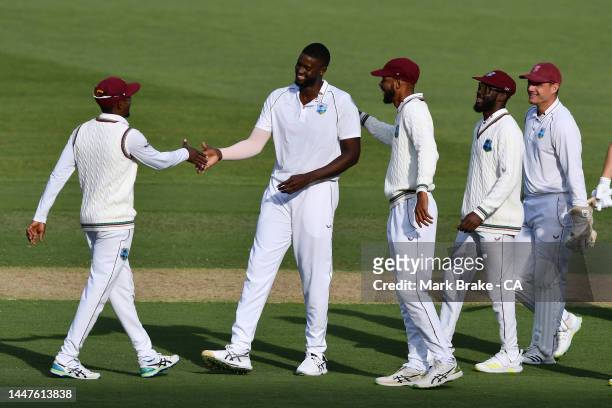 Jason Holder of West Indies celebrates the wicket of Steve Smith of Australia caught and bowled during day one of the Second Test Match in the series...