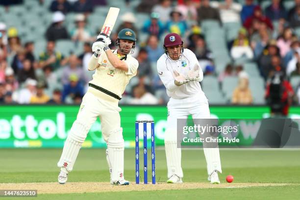 Travis Head of Australia bats during day one of the Second Test Match in the series between Australia and the West Indies at Adelaide Oval on...