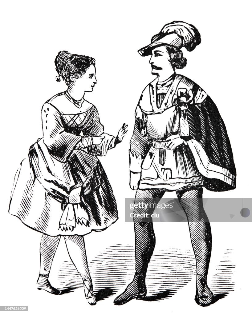 Mittelalterliches Paar im Gespräch, er mit Robin-Hood-Hut und Umhang, sie mit kurzem Rock, in voller Länge