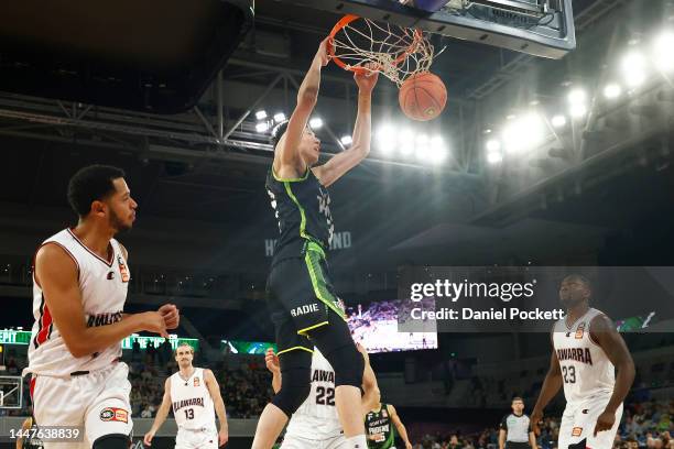 Zhou Qi of the Phoenix dunks during the round 10 NBL match between South East Melbourne Phoenix and Illawarra Hawks at John Cain Arena, on December...