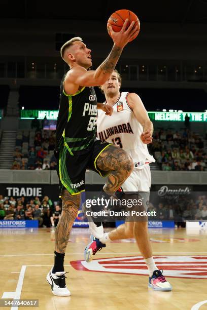 Mitchell Creek of the Phoenix drives to the basket during the round 10 NBL match between South East Melbourne Phoenix and Illawarra Hawks at John...