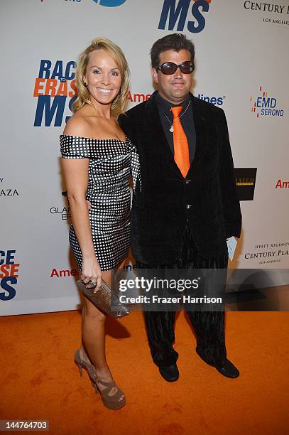 Christina Martin and Jason Davis arrive at the 19th Annual Race to Erase MS held at the Hyatt Regency Century Plaza on May 18, 2012 in Century City,...