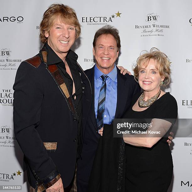 Musician Michael Blakey, radio personality Rick Dees, and Julie Dees arrive at the Beverly Wilshire "After Dark" Concert Series Featuring Margo Rey...