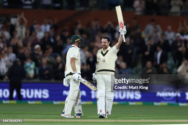 Travis Head of Australia celebrates making his century with Marnus Labuschagne of Australia during day one of the Second Test Match in the series...