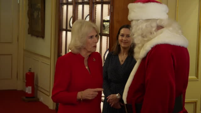 GBR: Queen Consort Camilla welcomes children to Clarence House to help decorate the Christmas tree