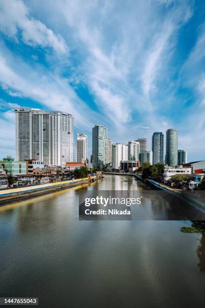 waterfront view to makati, metro manila city skyline - greater manila area bildbanksfoton och bilder