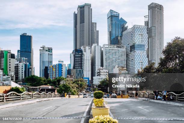 vista moderna del horizonte de manila del área de makati - manila fotografías e imágenes de stock