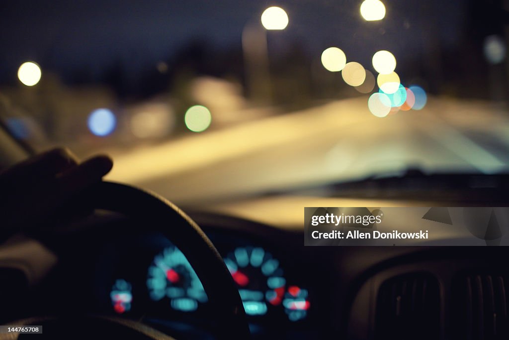 Driving at night hand on wheel