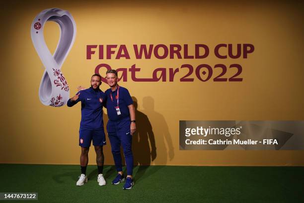 Memphis Depay of Netherlands and Louis van Gaal, Head Coach of Netherlands, pose on the Green Carpet ahead of a press conference on match day -1 at...