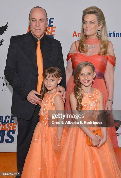 Ken Rickel, Nancy Davis, Isabella Rickel and Mariella Rickel arrive at the 19th Annual Race to Erase MS held at the Hyatt Regency Century Plaza on...