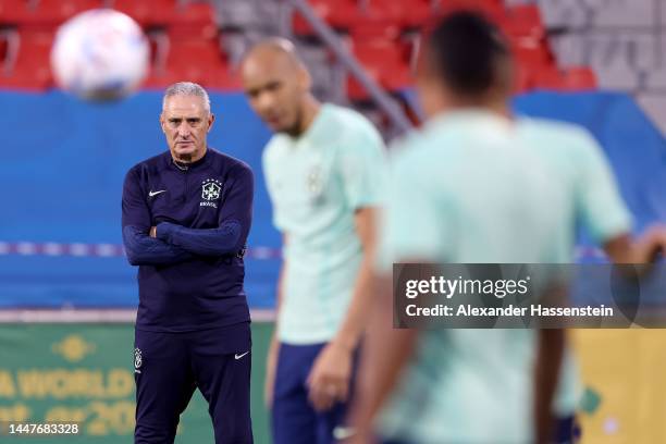 Tite, head coach of Brazil looks on during a training session on match day -1 at Al Arabi SC Stadium on December 08, 2022 in Doha, Qatar.