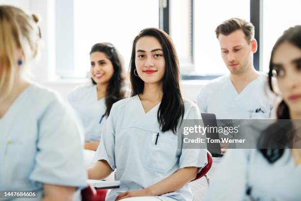 portrait of dark haired student dentist - study participant stock pictures, royalty-free photos & images