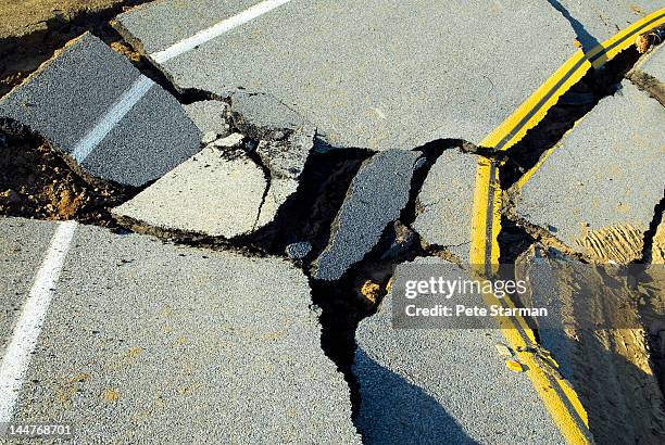 road destroyed by the effects of heavy rain - earthquake road stock pictures, royalty-free photos & images