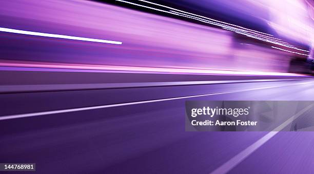 moving city road at night - light trail stock pictures, royalty-free photos & images