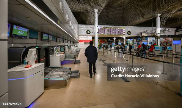 Air Portugal unused Check-In counters and few passengers are seen in Humberto Delgado International Airport as TAP Air Portugal cancels 360 flights...