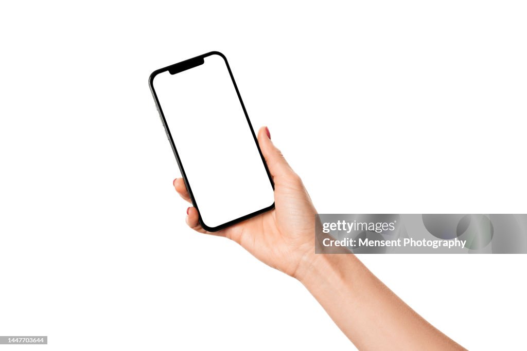 Hand holding modern mobile phone iphone mockup with white screen on white background