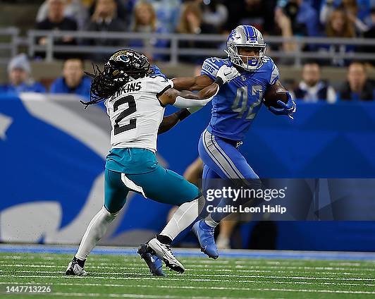 Justin Jackson of the Detroit Lions runs for a first down during the fourth quarter of the game against the Jacksonville Jaguars at Ford Field on...