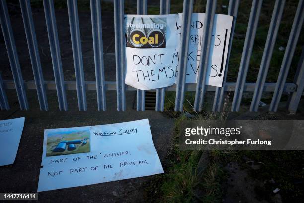 Placards in support of coal mining are placed by the gate of the former Woodhouse Colliery site where West Cumbria Mining have been given approval to...