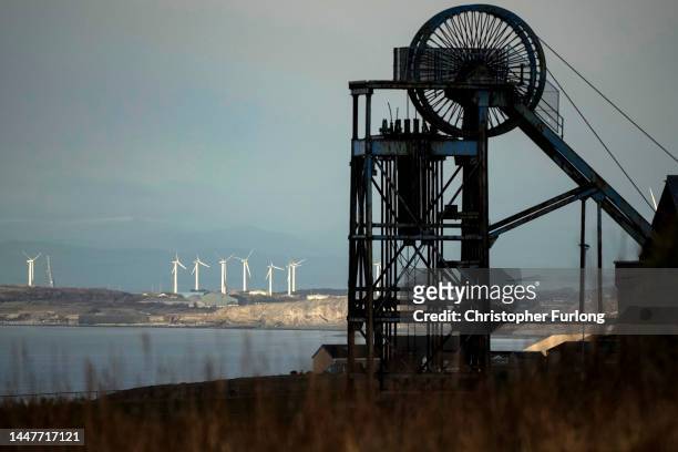 The winding wheel of Haig Colliery Mining Museum adjacent to the West Cumbria Mining offices who been given approval to once again extract coal on...