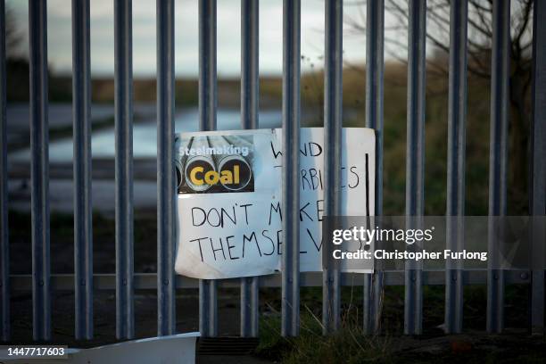 Placards in support of coal mining are placed by the gate of the former Woodhouse Colliery site where West Cumbria Mining have been given approval to...