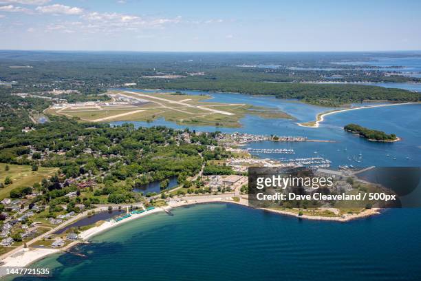 aerial view of sea and cityscape against sky,groton,connecticut,united states,usa - connecticut landscape stock pictures, royalty-free photos & images