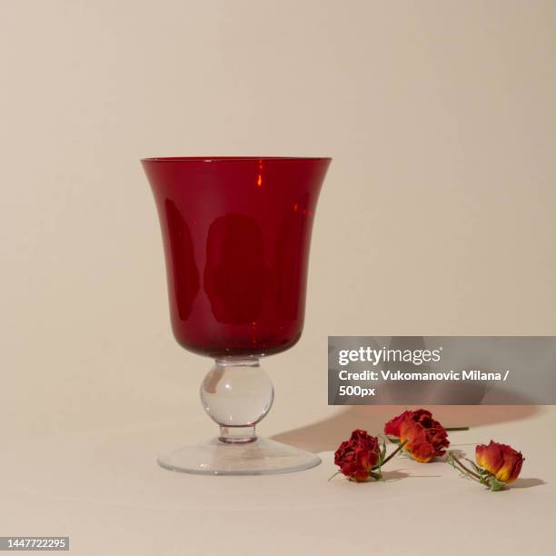 standing wine glass and red roses,novi sad,serbia - passover symbols stock pictures, royalty-free photos & images