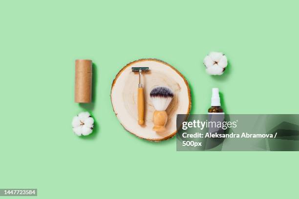 zero waste accessories on mint green background,berlin,germany - scheerkwast stockfoto's en -beelden