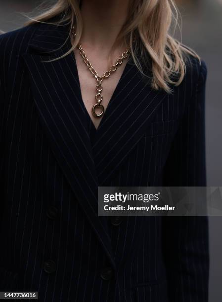 Model and Content Creator Marlies Pia Pfeifhofer wearing LeGer by Lena Gercke navy blue pinstriped suit blazer and Laura Lombardi silver statement...