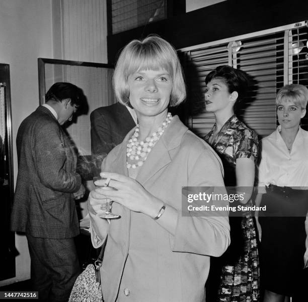 British actress Jill Bennett attending an event at British fashion designer Mary Quant's second 'Bazaar' boutique in Knightsbridge, London, on...