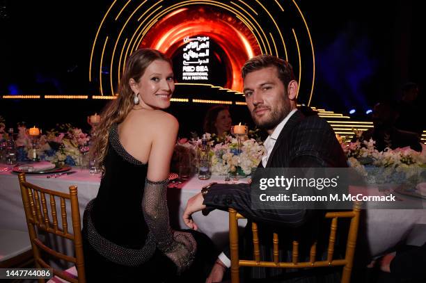 Toni Garrn and Alex Pettyfer attend the Closing Night Gala Dinner at the Red Sea International Film Festival on December 08, 2022 in Jeddah, Saudi...