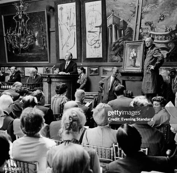 View of the salesroom at Sotheby's auction house in London during a sale of impressionist and modern drawings and paintings, August 2nd 1961.