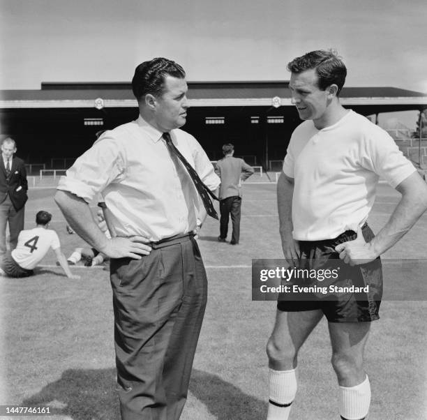 England football coach Harold Shepherdson and footballer Jimmy Armfield , a defender with Blackpool football club, during training at Highbury ahead...