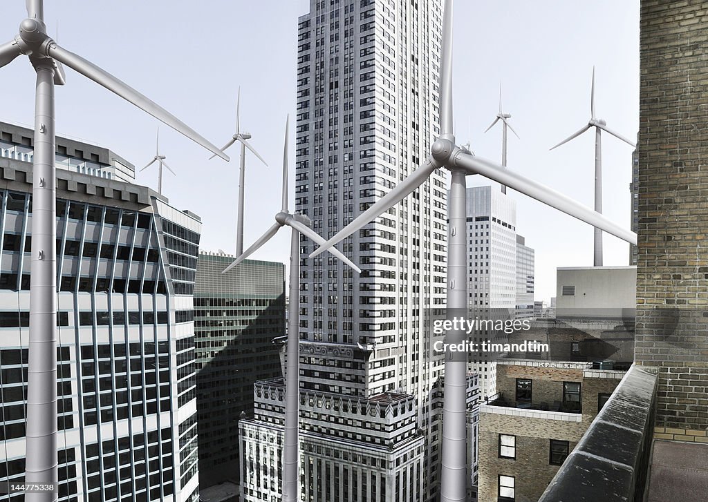 Wind mills among buildings in the city