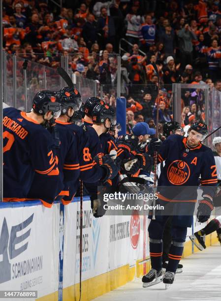 Leon Draisaitl of the Edmonton Oilers celebrates a third period goal with teammates during the game against the Arizona Coyotes on December 7, 2022...