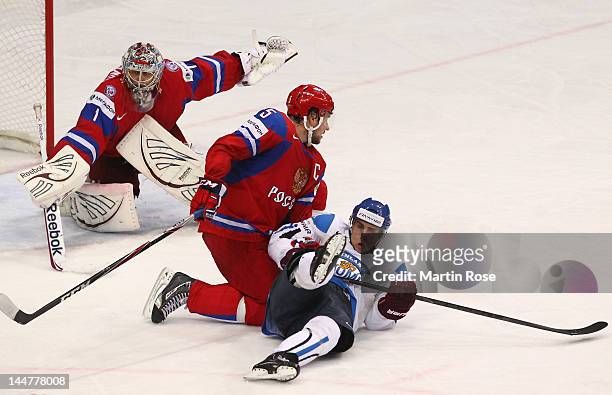 Ilya Nikulin of Russia battlles for position with Valtteri Filppula of Finland the IIHF World Championship semi final match between Russia and...