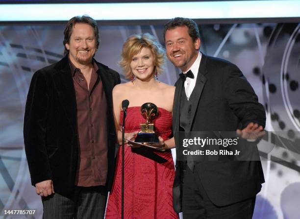 Country Singer Alison Krauss with Jerry Douglas and Dan Tyminski of band 'Union Station' backstage at Grammy Awards, February 8, 2006 in Los Angeles,...