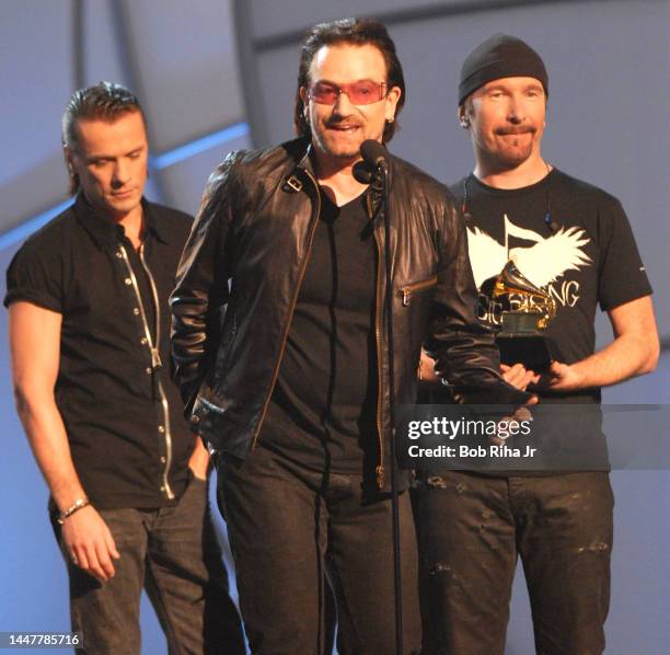 Bono is joined by U2 band members Larry Mullen and The Edge during the Grammy Awards Show, February 8, 2006 in Los Angeles, California.