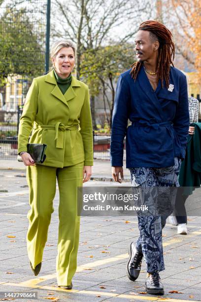 Queen Maxima of The Netherlands visits OBS De Globe school to see the music lessons ahead of the Christmas concert of the largest school band next...