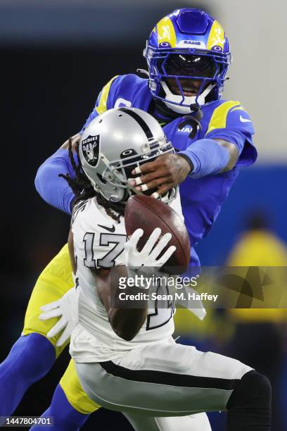 Davante Adams of the Las Vegas Raiders makes a reception against Jalen Ramsey of the Los Angeles Rams during the first quarter at SoFi Stadium on...
