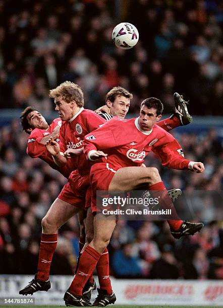 Karl Heinz Riedle, Steve Staunton and Jamie Carragher of Liverpool rise to deny the ball to Duncan Ferguson of Newcastle United on 28th December 1998...