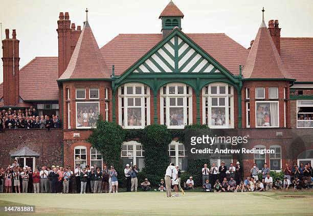 Tom Lehman of the United States hugs his caddy Andy Martinez after winning the 125th Open Championship on 21st July 1996 at the Royal Lytham and St...