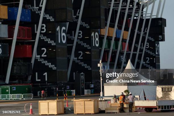 Construction workers dismantle the Stadium 974 for World Cup Qatar 2022 on December 8, 2022 in Doha, Qatar. The stadium was primarily built using 974...