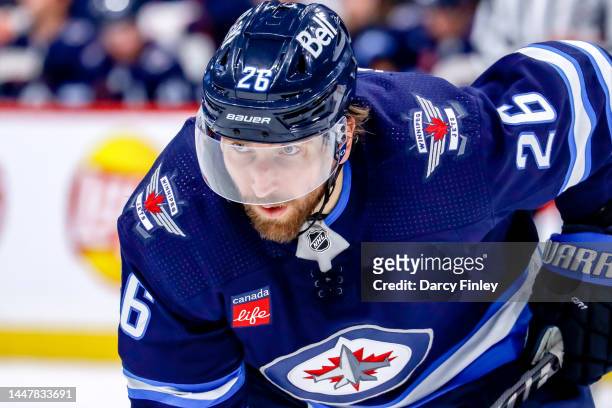 Blake Wheeler of the Winnipeg Jets gets set during a second period face-off against the Anaheim Ducks at the Canada Life Centre on December 4, 2022...