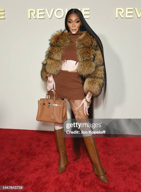 Winnie Harlow attends Revolve x AT&T Present Revolve Winterland on December 08, 2022 in Los Angeles, California.