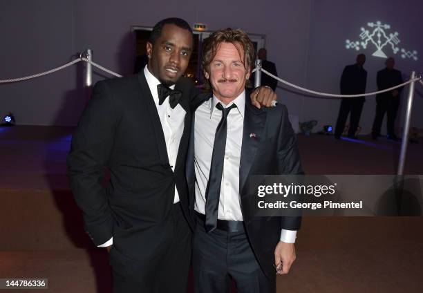 Musician Sean Combs and actor Sean Penn attend the Haiti Carnival in Cannes Benefitting J/P HRO, Artists for Peace and Justice & Happy Hearts Fund...